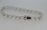 Sterling Silver Semi Mount Tennis Bracelet Setting with oval gemstone placeholders and stainless steel tongue clasp.